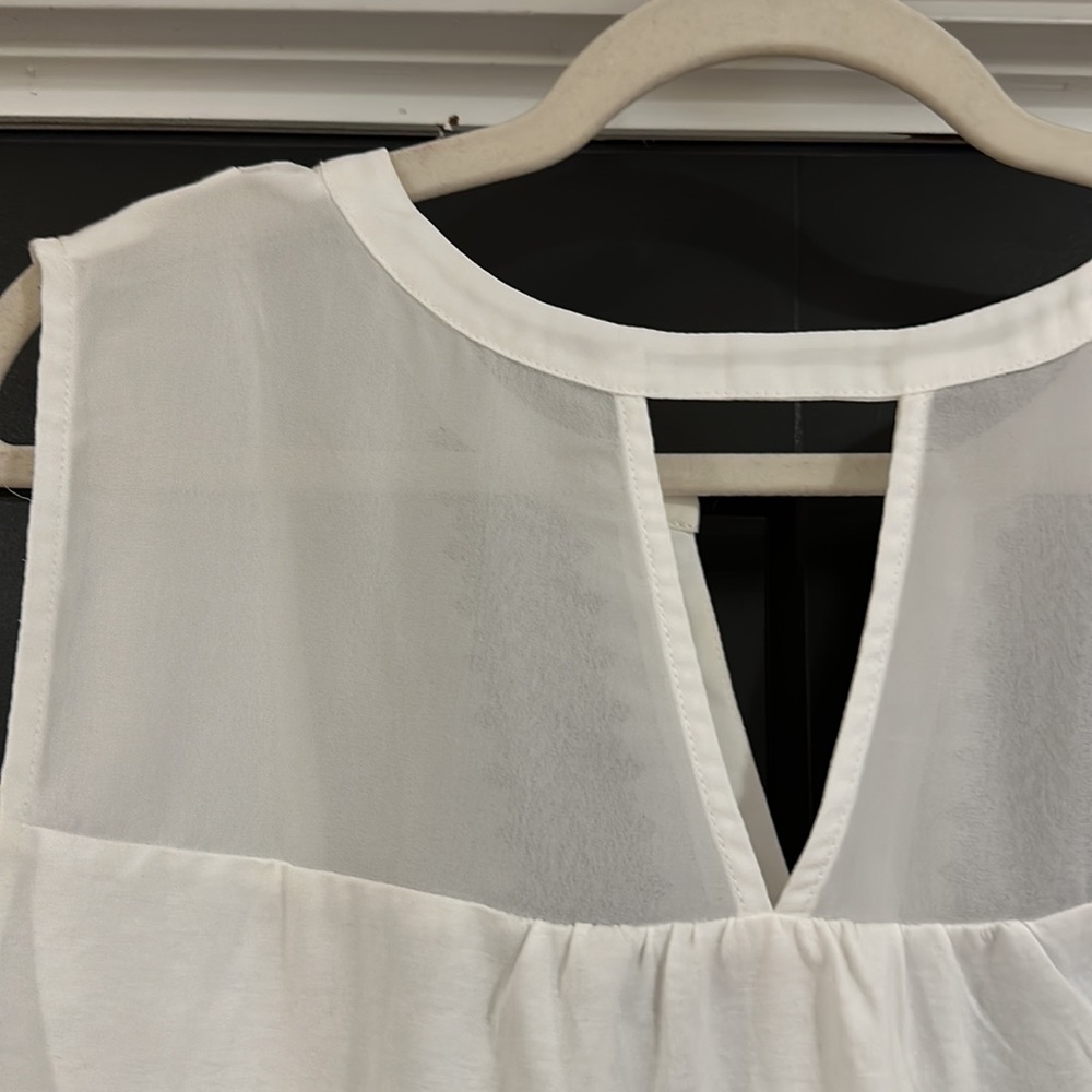 Brand new never worn! White float tank top with blue stitching. - Picture 5 of 7